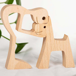 A Man And Dog With Pointy Ears Wood Sculpture
