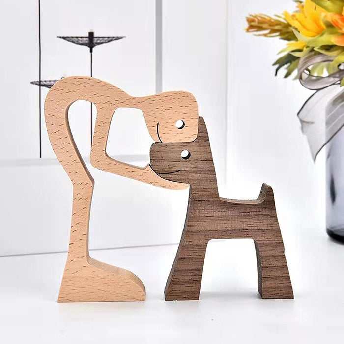 A Man And Dog With Pointy Ears Wood Sculpture