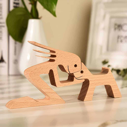 A Woman And Dog With Pointy Ears Wood Sculpture