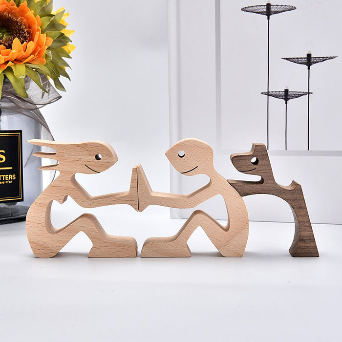 A Couple With Black Dog Wood Sculpture